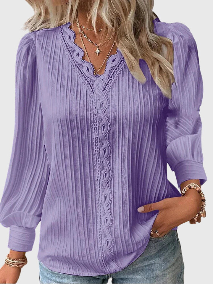 Andrea™ Isabel y Miguel Madrid elegant jersey blouse, soft fabric, long sleeves, round neckline, in a neutral color.