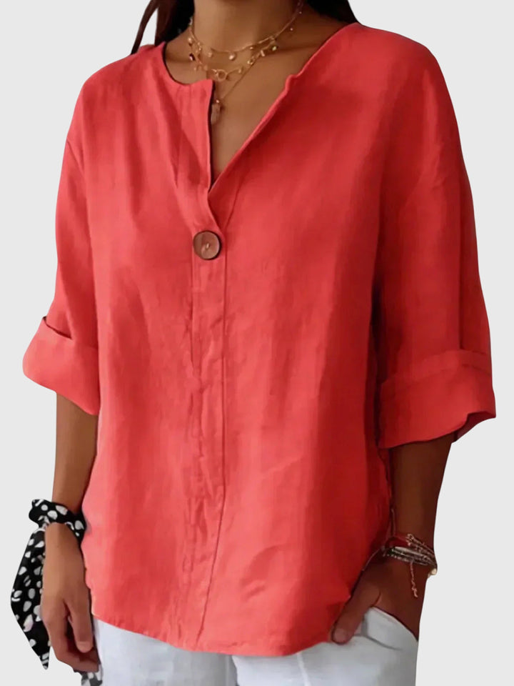 Elegant Gemma™ blouse by Isabel y Miguel Madrid, featuring a comfortable fit and stylish design, shown in a close-up image.