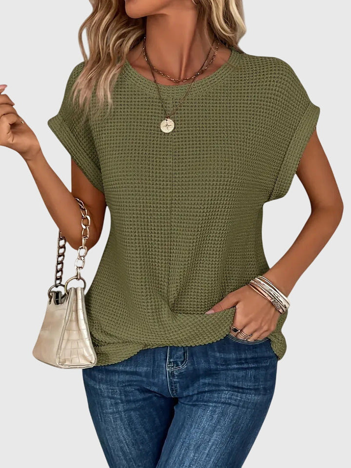 Isa™ Blusa chic con cuello redondo from Isabel y Miguel Madrid, featuring a stylish design and comfortable fit.