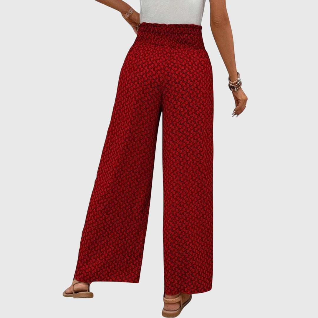Pantalones palazzo elegantes Chiara de Isabel y Miguel Madrid en color oscuro, con estilo sofisticado y cómodo para mujer.