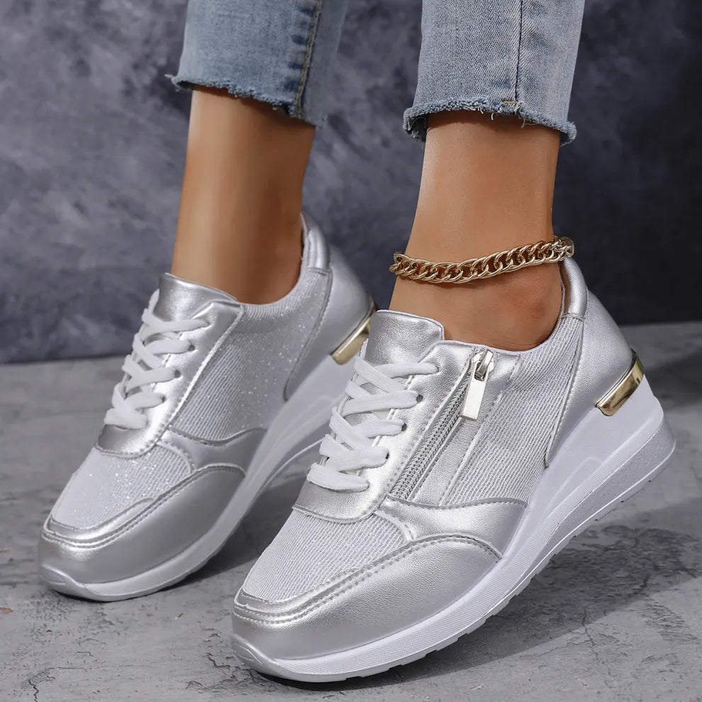 Orthopedic women's sneakers with laces and side zipper from Isabel y Miguel Madrid, featuring comfortable design and supportive sole.