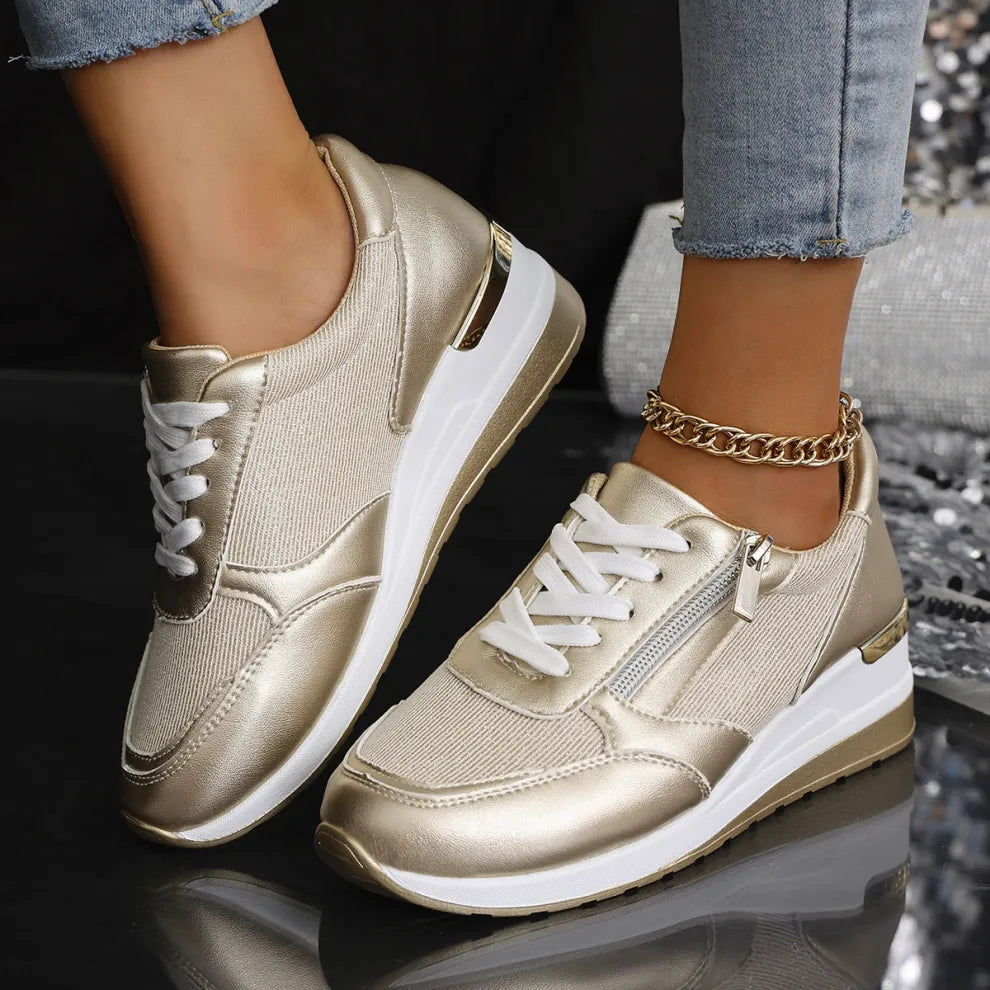 Orthopedic women's sneakers with laces and side zipper by Isabel y Miguel Madrid, featuring supportive design and casual style.
