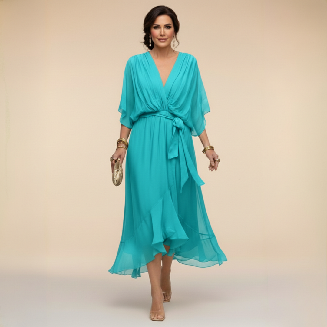 Isabel y Miguel Madrid Monica chiffon dress with V-neck, flowing fabric and elegant design, perfect for formal occasions.