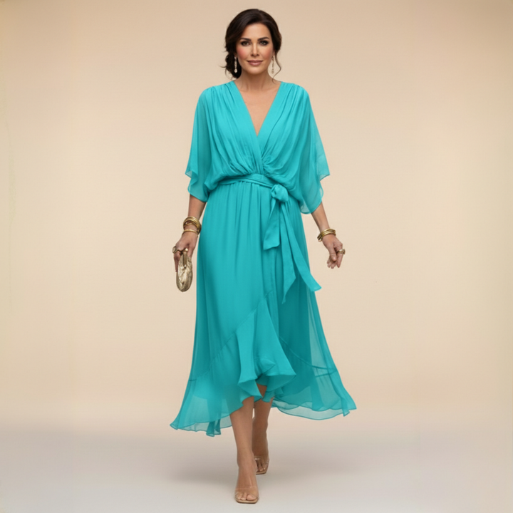 Isabel y Miguel Madrid Monica chiffon dress with V-neck, flowing fabric and elegant design, perfect for formal occasions.