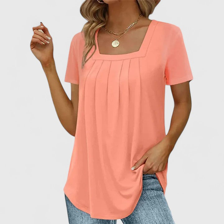 Lenabria Isabel y Miguel Madrid summer shirt for women, elegant lightweight blouse with floral pattern and short sleeves.