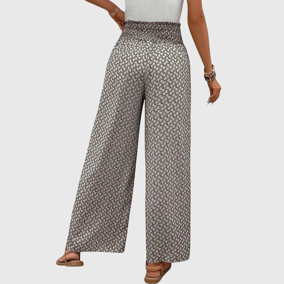 Pantalones palazzo elegantes Chiara de Isabel y Miguel Madrid, con diseño fluido y estilo sofisticado.