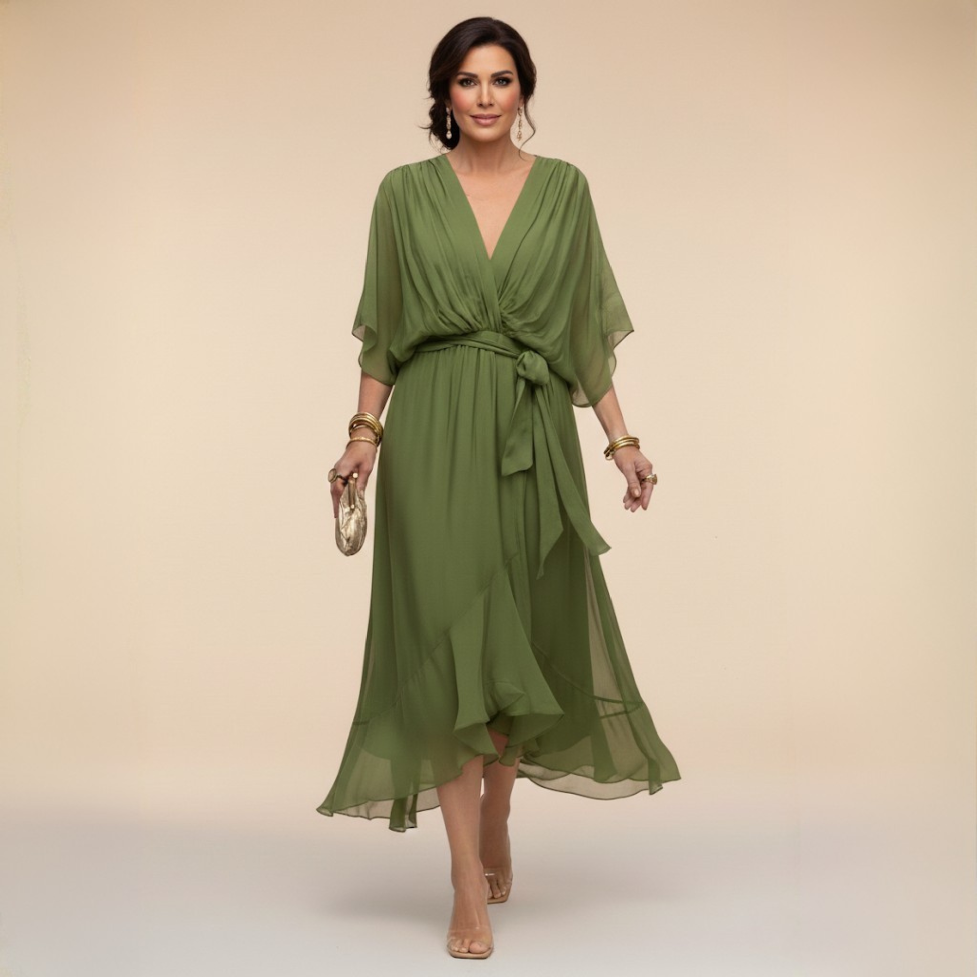 Isabel y Miguel Madrid Monica chiffon dress with V-neckline, flowing fabric, and elegant design.