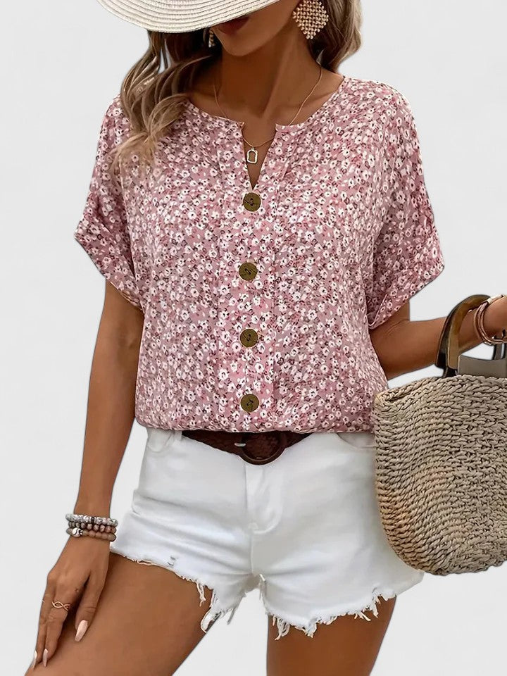 Isabel y Miguel Madrid Sabine Elegante Top Floral de Verano with vibrant summer floral pattern and lightweight fabric.