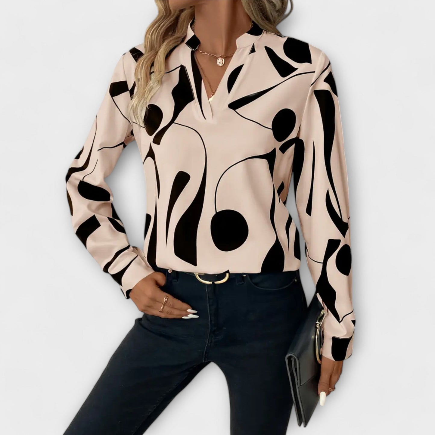 Elegant Lara™ blouse by Isabel y Miguel Madrid, featuring a stylish design and quality fabric, shown on a mannequin.