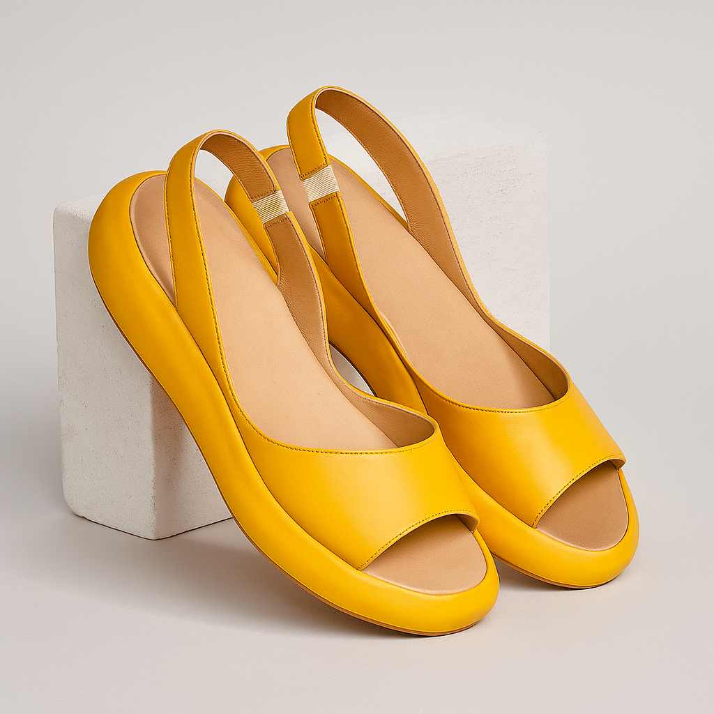 Sandalias abiertas Giselle de Isabel y Miguel Madrid en color amarillo, con suelas antideslizantes y diseño cómodo.