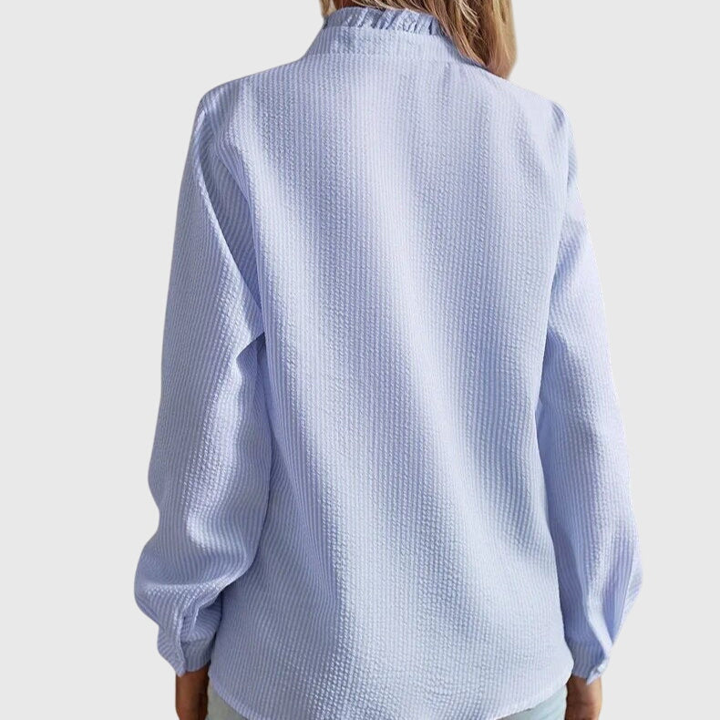 Elegant Kaitlyn™ blouse by Isabel y Miguel Madrid featuring a stylish, flowing design perfect for sophisticated outfits.