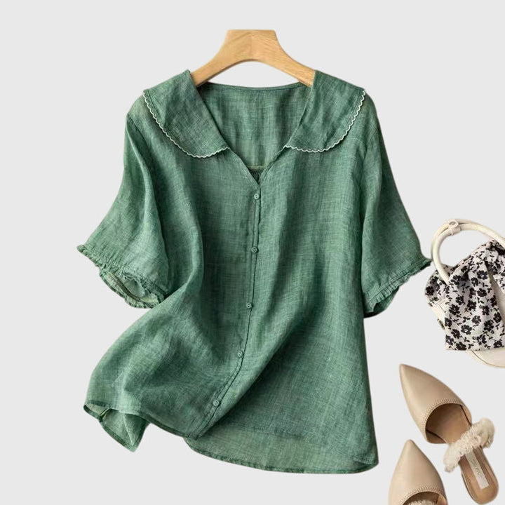 Elegant Adele™ blouse by Isabel y Miguel Madrid, featuring a stylish design with a flattering fit and sophisticated details.
