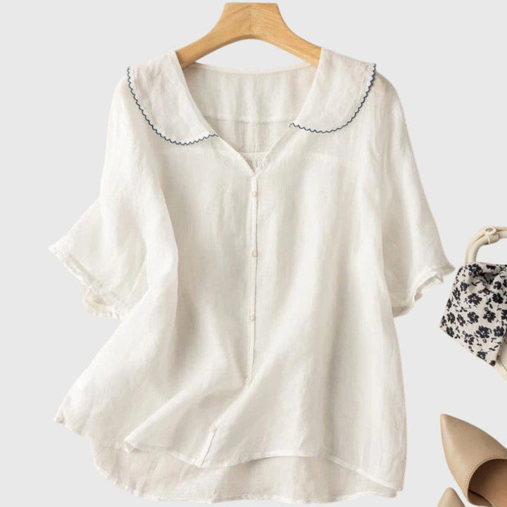 Elegant Adele™ blouse by Isabel y Miguel Madrid, featuring a stylish design with delicate fabric and sophisticated details.