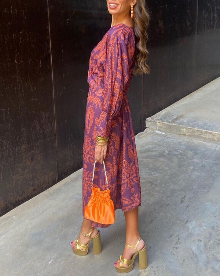 Isadora™ midi dress by Isabel y Miguel Madrid featuring elegant timeless print and flowing fabric, perfect for sophisticated occasions.