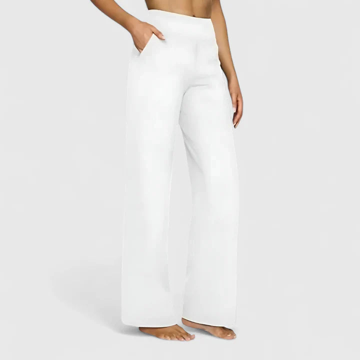 Pantalones elegantes de vestir Isabel y Miguel Madrid, estilo moderno, en color neutro y corte ajustado, para mujer.