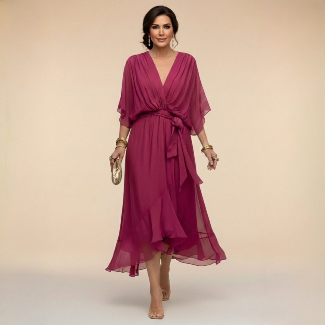 Light pink chiffon dress with V-neckline from Isabel y Miguel Madrid's Monica collection, featuring flowy fabric and elegant design.