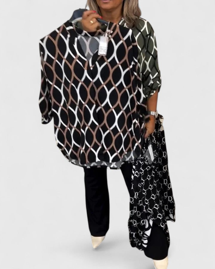 Elegant Isabel y Miguel Madrid Ella blouse featuring stylish design and lightweight fabric, perfect for sophisticated outfits.