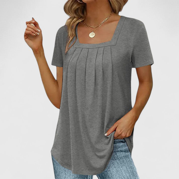 Lenabria summer blouse for women by Isabel y Miguel Madrid, lightweight and elegant, shown in a stylish summer shirt design.
