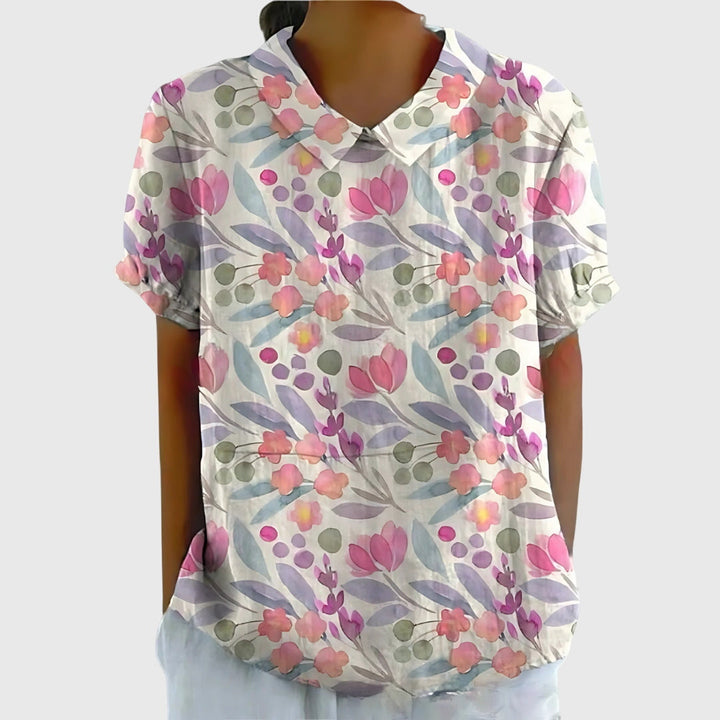 Jenna™ floral blouse by Isabel y Miguel Madrid featuring colorful floral print and lightweight fabric, casual and stylish for summer wear.