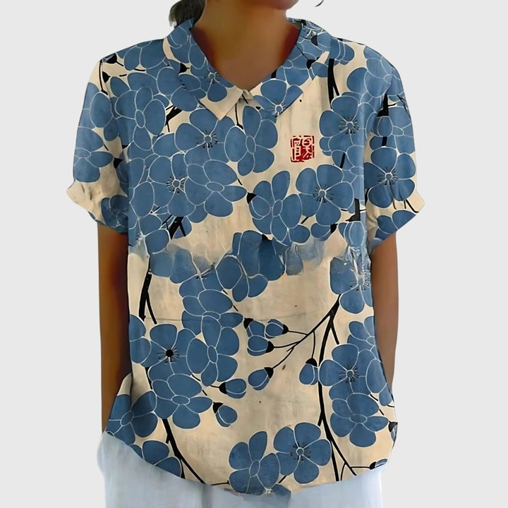 Jenna™ floral blouse by Isabel y Miguel Madrid featuring colorful flower print and lightweight fabric.