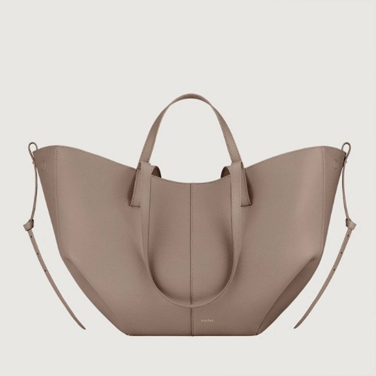 Olivia vintage tote bag by Isabel y Miguel Madrid, featuring textured leather and spacious design, shown in a close-up view.