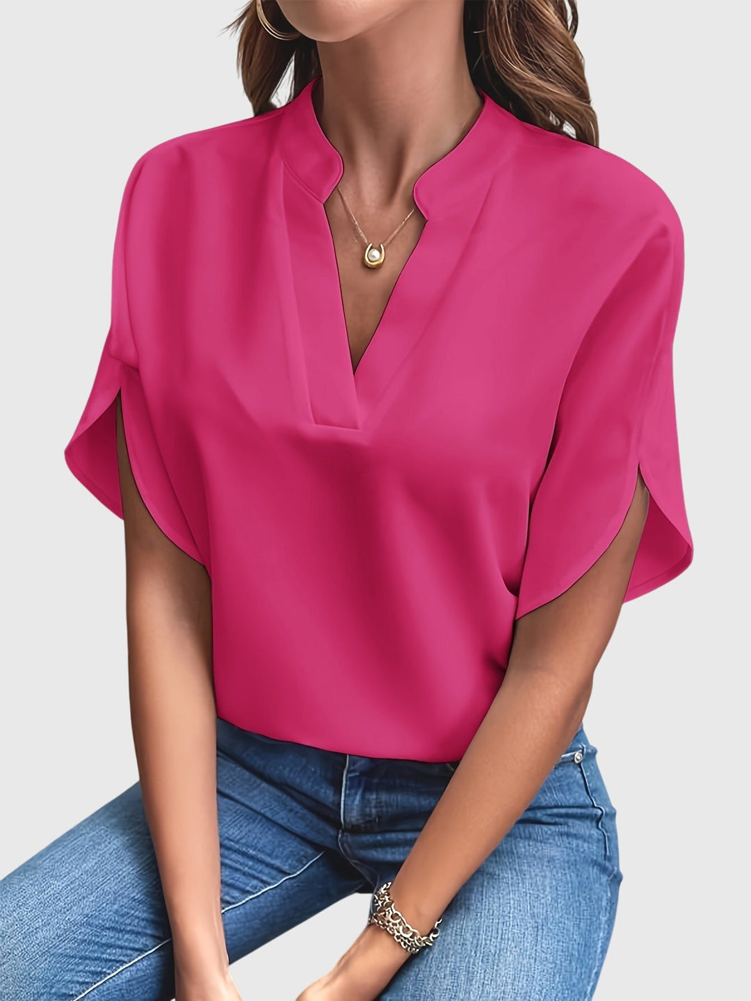 Elegant Kristie™ blouse by Isabel y Miguel Madrid, featuring stylish design and high-quality fabric, displayed on a mannequin.