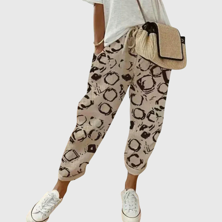 Pantalones de algodón confortables de Isabel y Miguel Madrid, pantalones casuales con diseño moderno y tela suave en color neutro