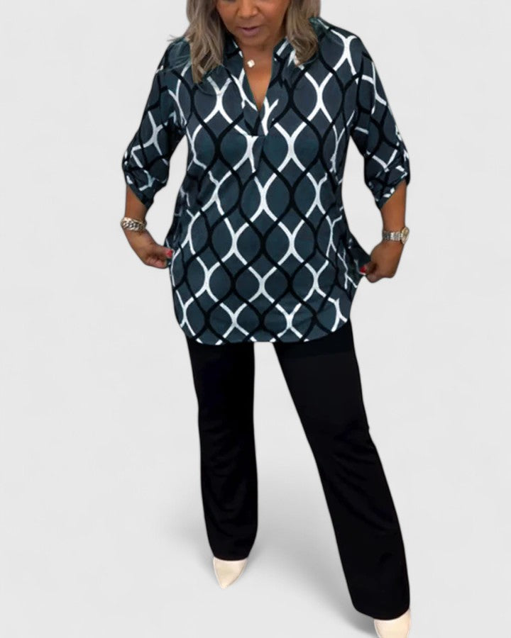 Ella elegant blouse by Isabel y Miguel Madrid, featuring stylish design and soft fabric, shown in a close-up image.