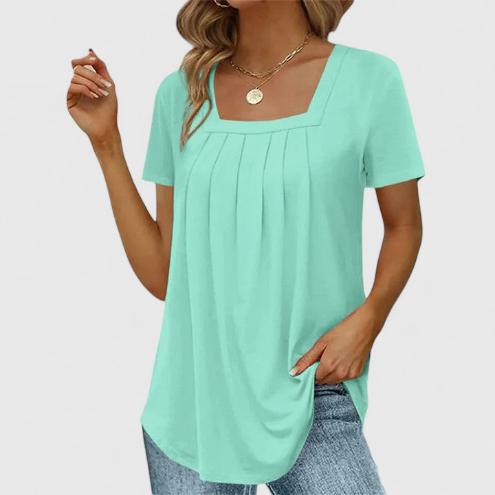 Lenabria summer blouse for women by Isabel y Miguel Madrid, featuring lightweight fabric and elegant design.