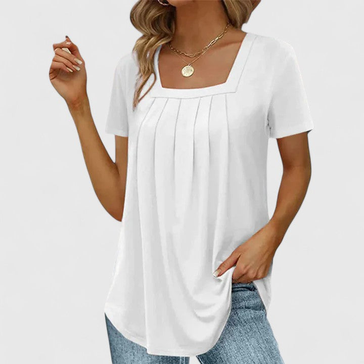 Lenabria elegant summer blouse for women by Isabel y Miguel Madrid, featuring lightweight fabric and stylish design.