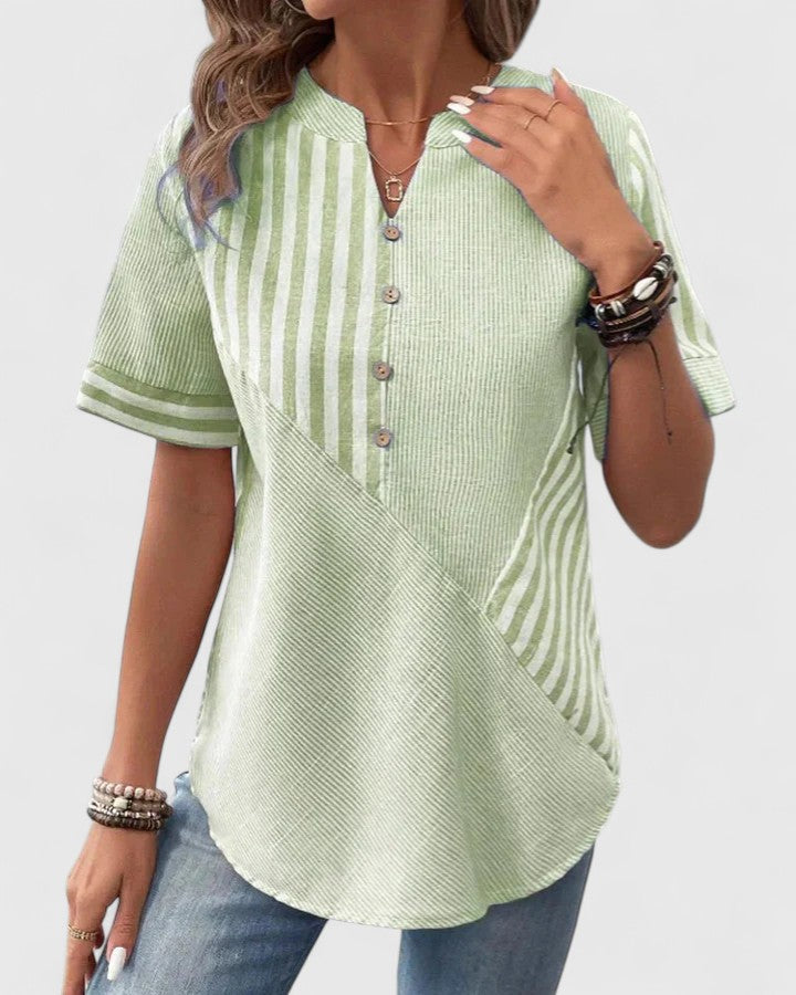 Elegant Gigi blouse by Isabel y Miguel Madrid, showcasing a sophisticated design in a stylish fabric.
