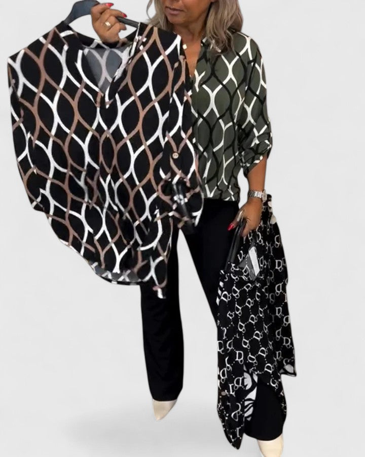 Elegant Isabel y Miguel Madrid Ella blouse with stylish design, shown in a well-fitted, fashionable image.