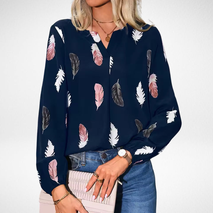 Nicole™ Isabel y Miguel Madrid fitted blouse in soft fabric, featuring a classic design with a round neckline and long sleeves.