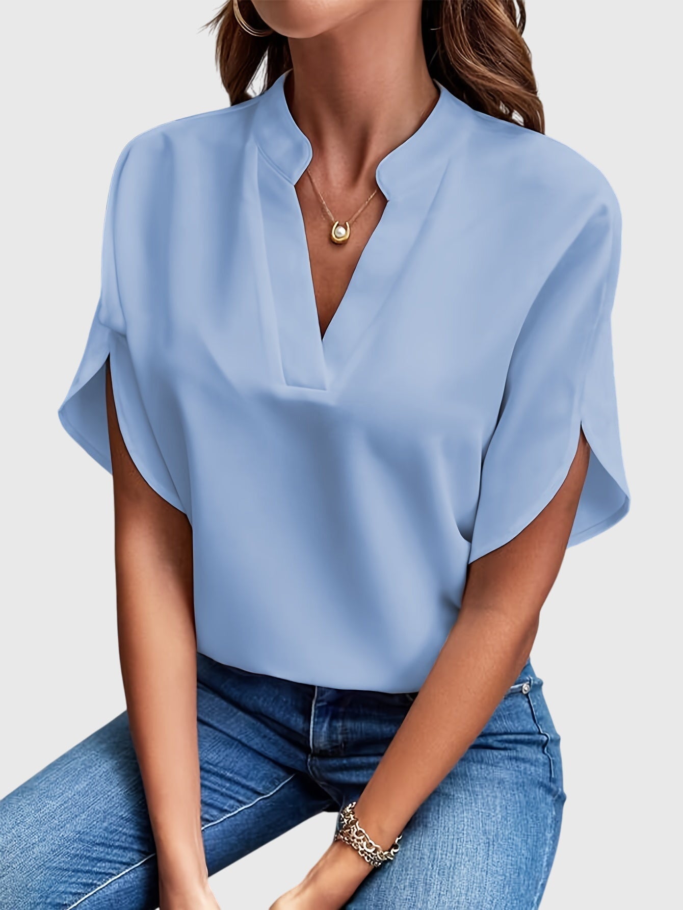 Elegant Kristie™ blouse by Isabel y Miguel Madrid, featuring a stylish design in soft fabric, showcased on a neutral background.