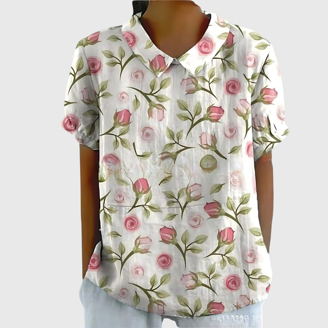Jenna™ floral blouse by Isabel y Miguel Madrid, featuring a colorful floral print and lightweight fabric on a model.