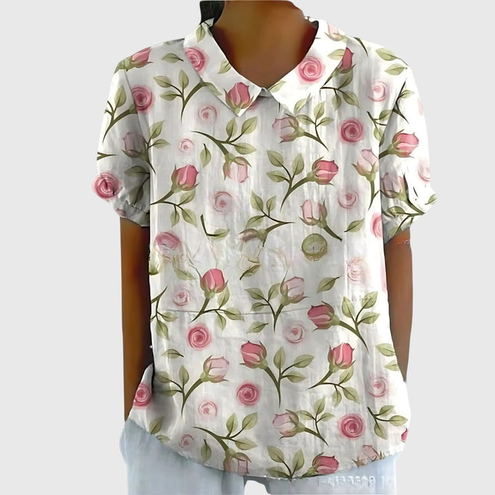 Jenna™ floral blouse by Isabel y Miguel Madrid, featuring a colorful floral print and lightweight fabric on a model.