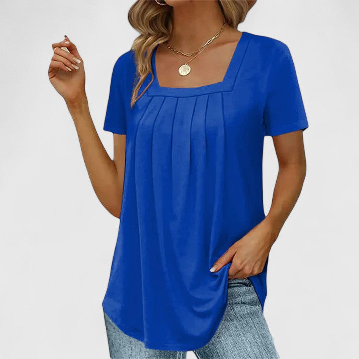 Lenabria Isabel y Miguel Madrid summer shirt for women, stylish lightweight blouse with short sleeves and floral pattern.