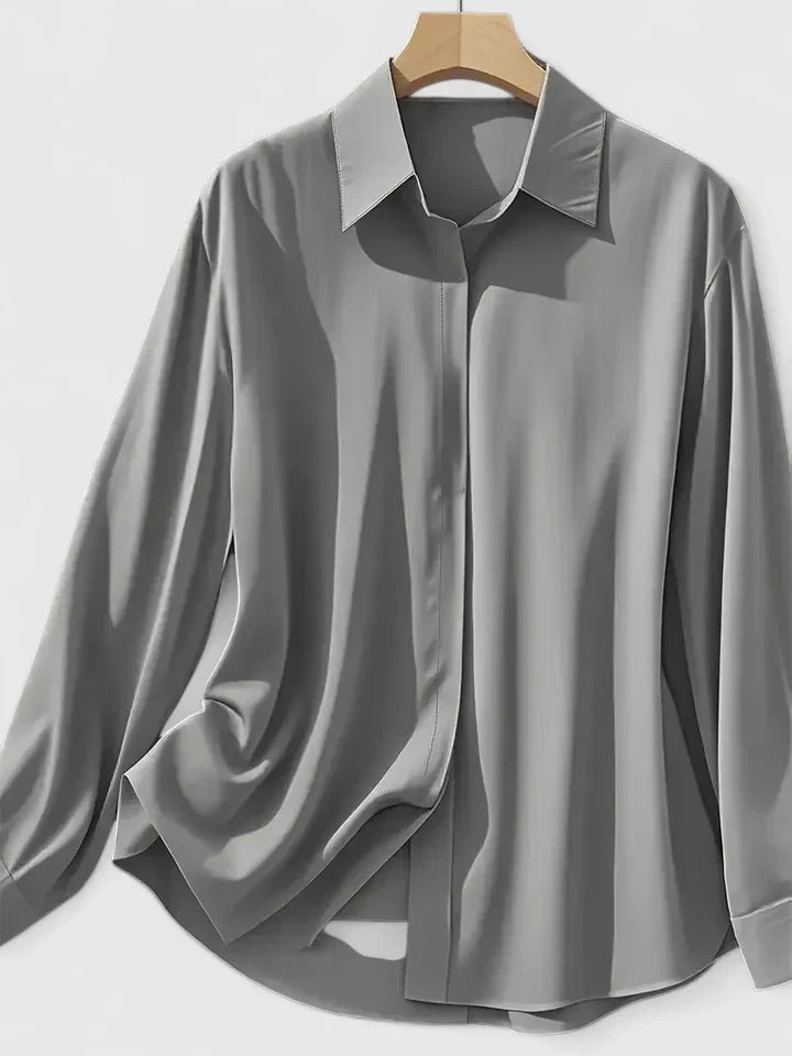Elegant Melvaya top by Isabel y Miguel Madrid, featuring stylish design and high-quality fabric, shown in a well-lit studio image.