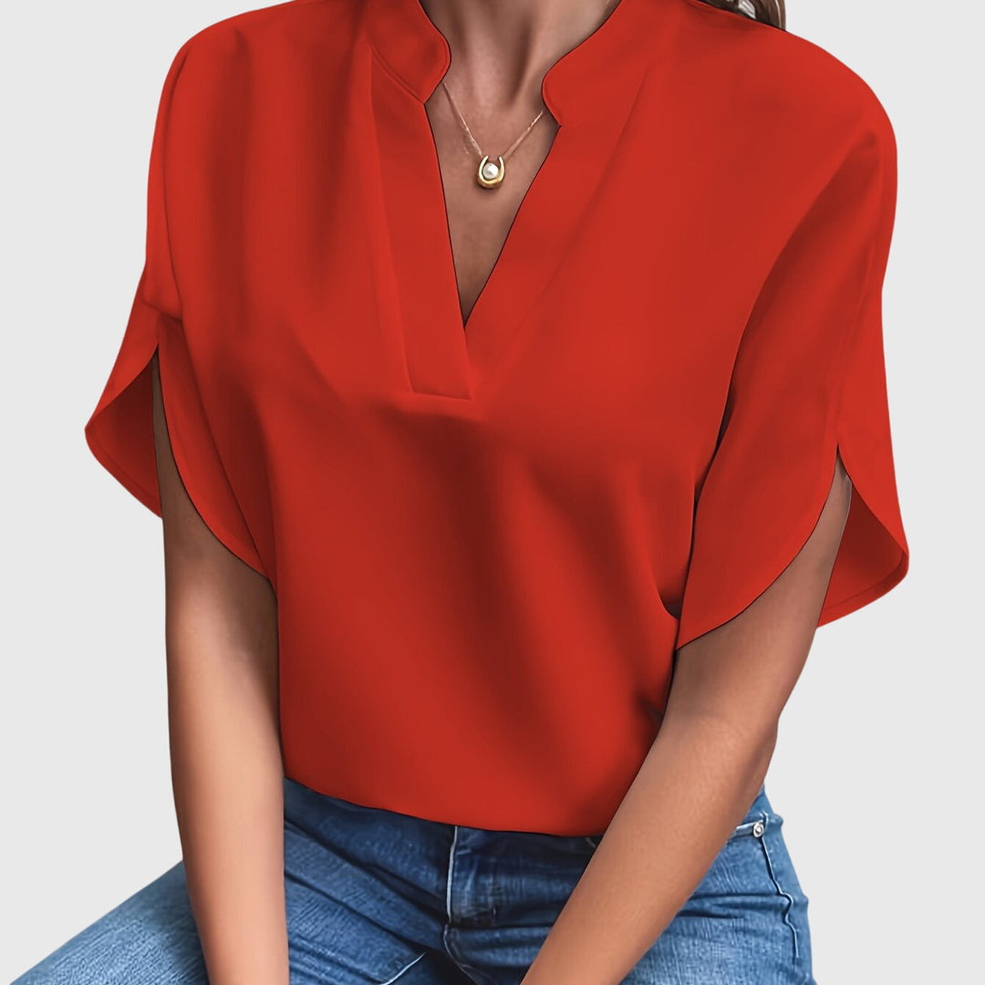 Elegant Kristie™ blouse by Isabel y Miguel Madrid, featuring a stylish design and lightweight fabric, perfect for sophisticated looks.
