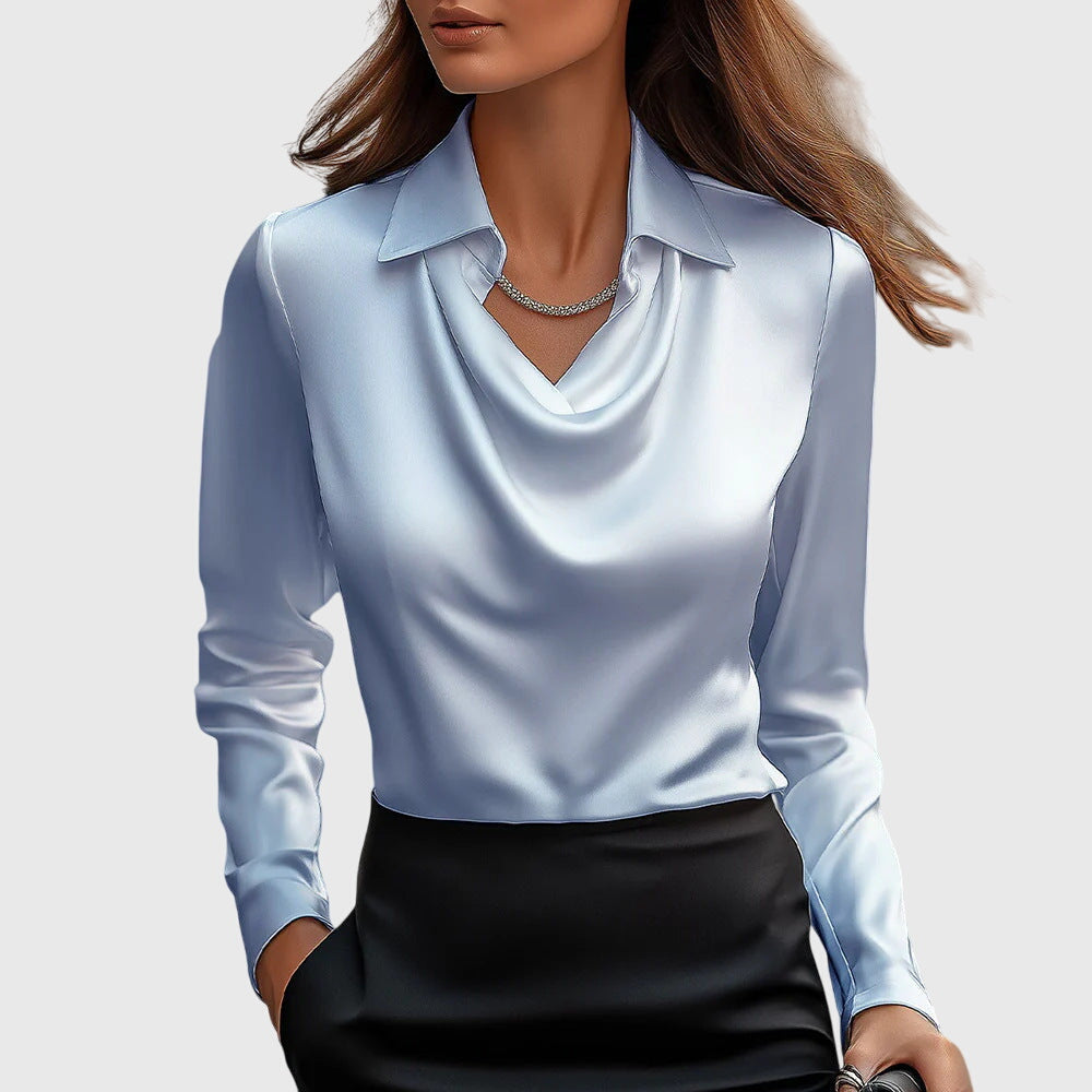Elegant Brooklyn™ blouse by Isabel y Miguel Madrid, featuring stylish design and soft fabric, shown in a close-up of the garment.