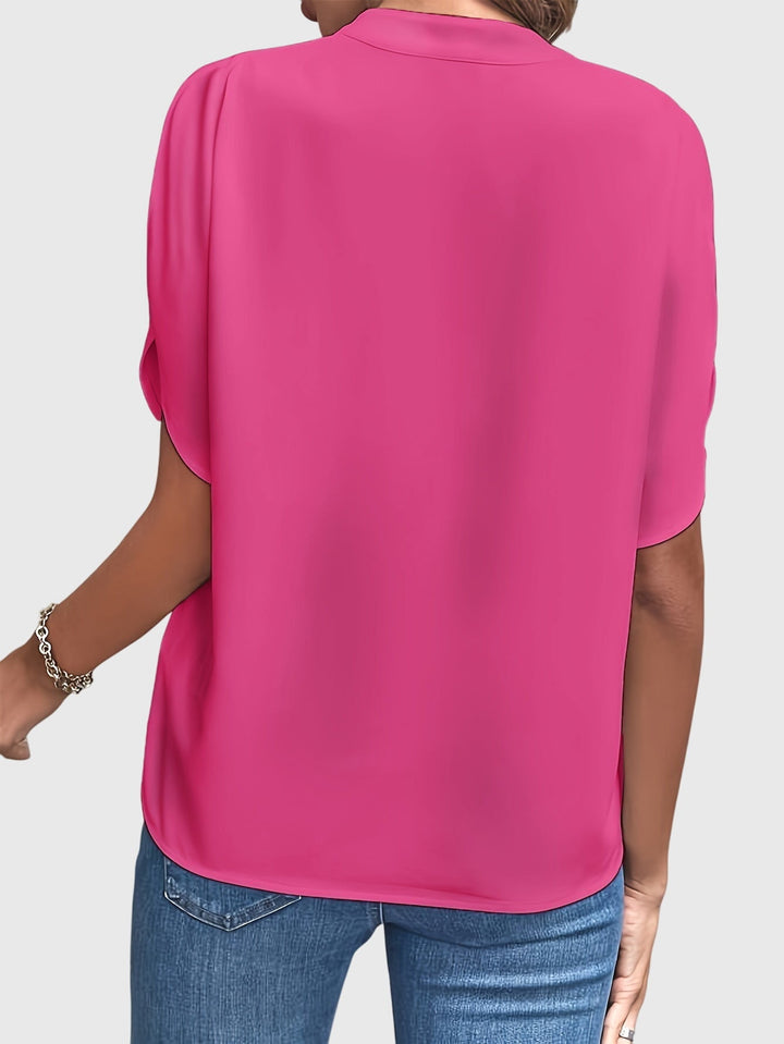 Elegant Kristie™ blouse by Isabel y Miguel Madrid, featuring stylish design and high-quality fabric suitable for sophisticated looks.