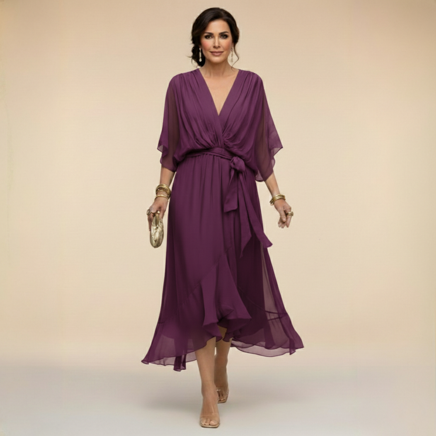 Isabel y Miguel Madrid Monica chiffon dress with V-neckline, flowy fabric, and elegant design for special occasions.
