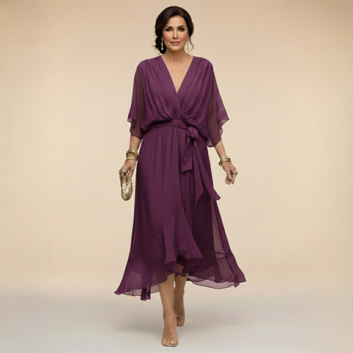 Isabel y Miguel Madrid Monica chiffon dress with V-neckline, flowy fabric, and elegant design for special occasions.