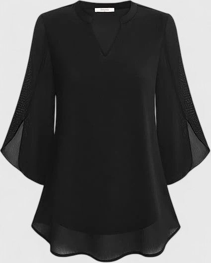 Celinora comfortable blouse by Isabel y Miguel Madrid, featuring soft fabric and casual style, displayed on a hanger.