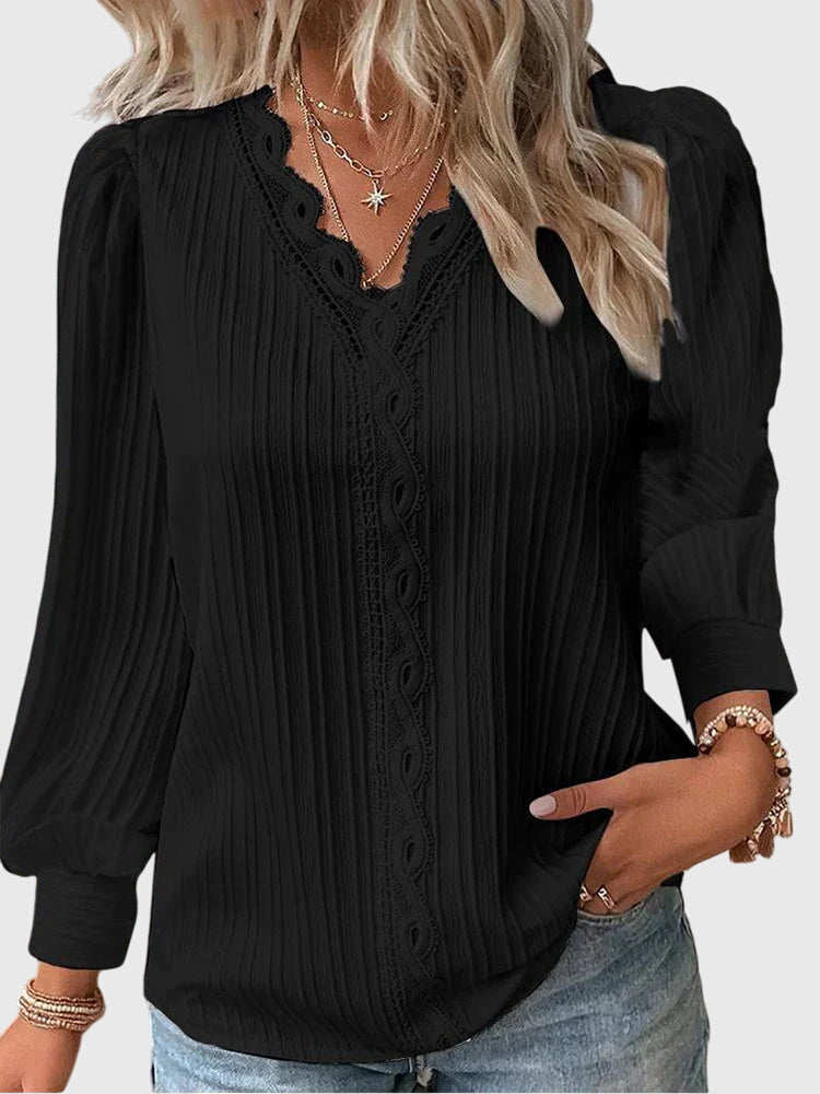 Andrea™ elegant jersey blouse by Isabel y Miguel Madrid, soft fabric, tailored fit, shown in a stylish close-up image.