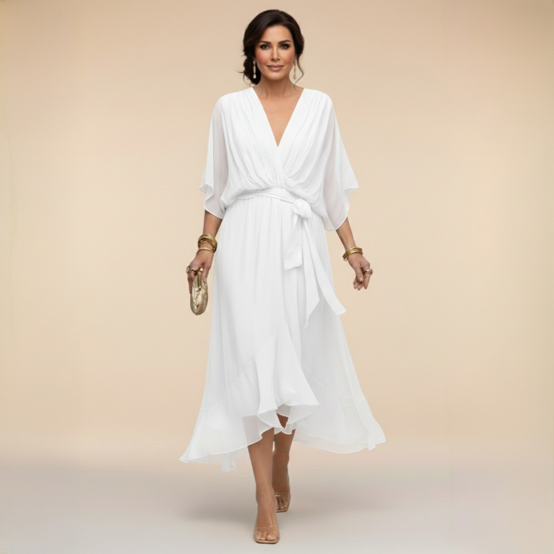 Isabel y Miguel Madrid Monica chiffon dress with V-neckline, flowing fabric, and elegant design for stylish occasions.