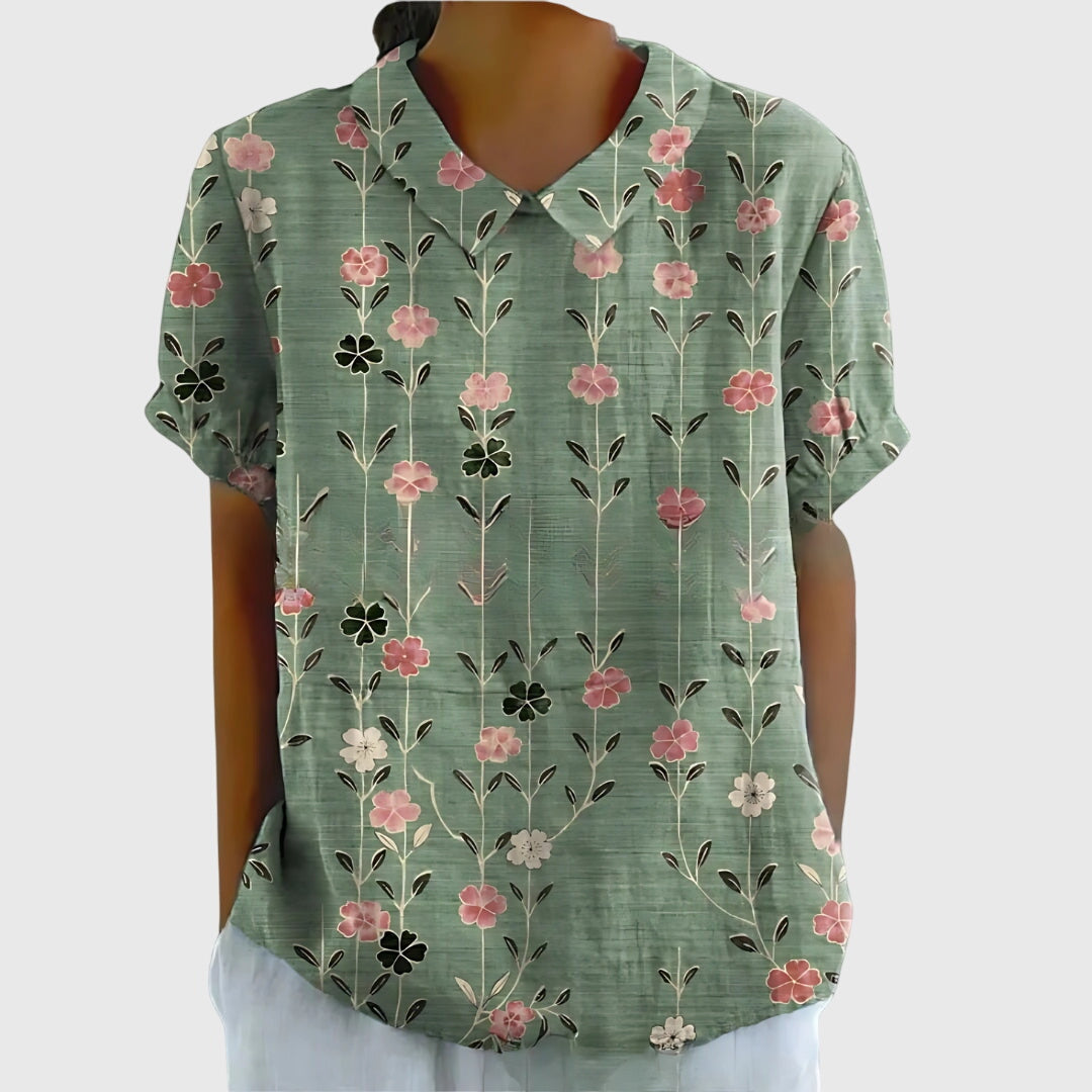 Floral Jenna™ blusa by Isabel y Miguel Madrid featuring lightweight fabric and vibrant flower patterns, perfect for spring.