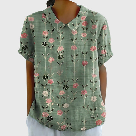 Floral Jenna™ blusa by Isabel y Miguel Madrid featuring lightweight fabric and vibrant flower patterns, perfect for spring.
