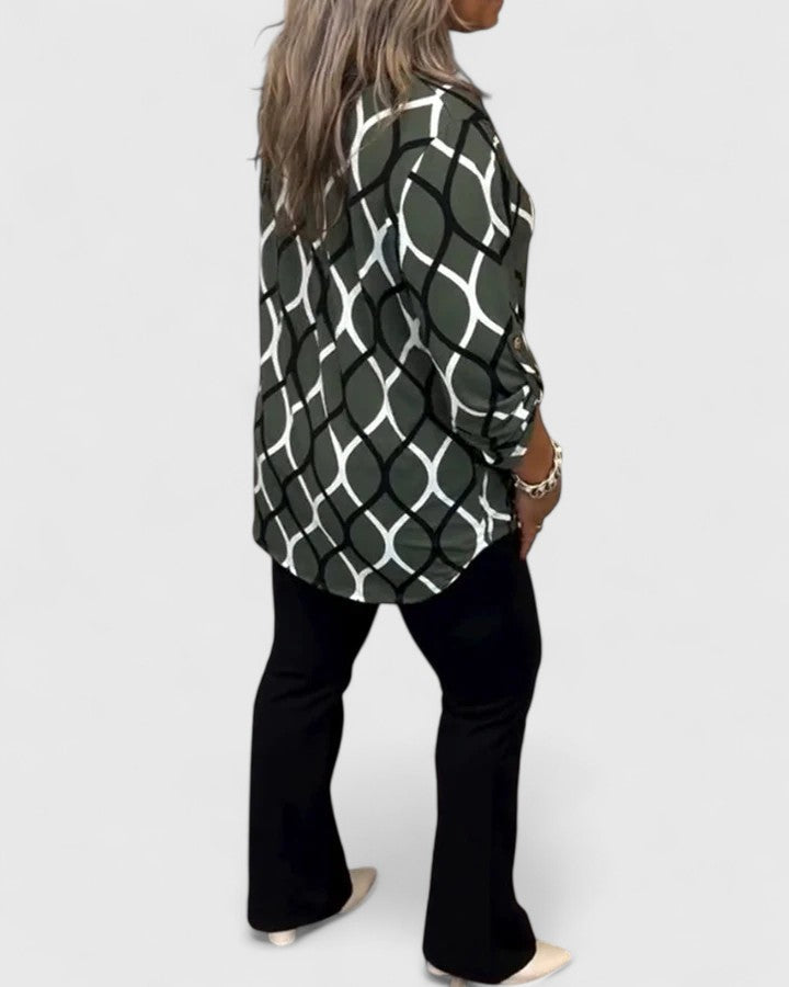 Elegant Isabel y Miguel Madrid Ella blouse with stylish design, featuring a flattering fit and sophisticated details.