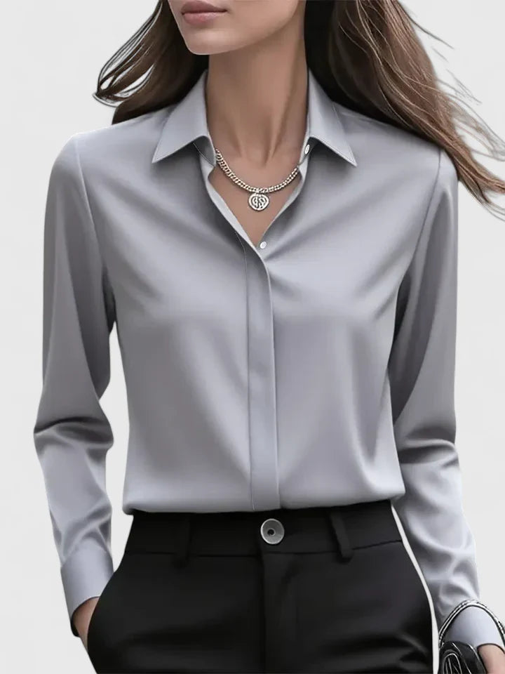 Elegant Melvaya top by Isabel y Miguel Madrid, featuring stylish design and fabric details in a close-up image.